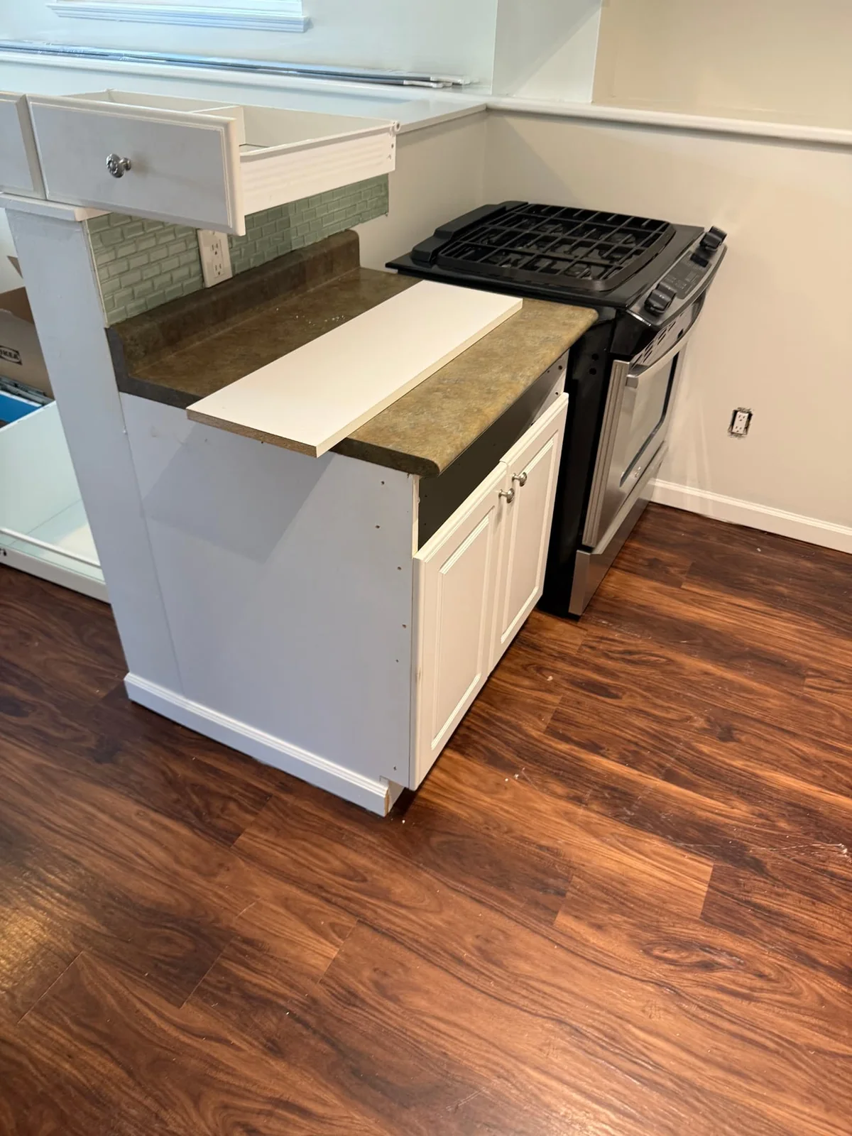 During — cabinetry opened and prepared for remodeling.