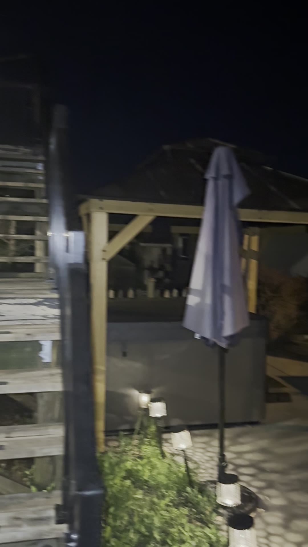 During — final construction and finishing work on the covered deck.