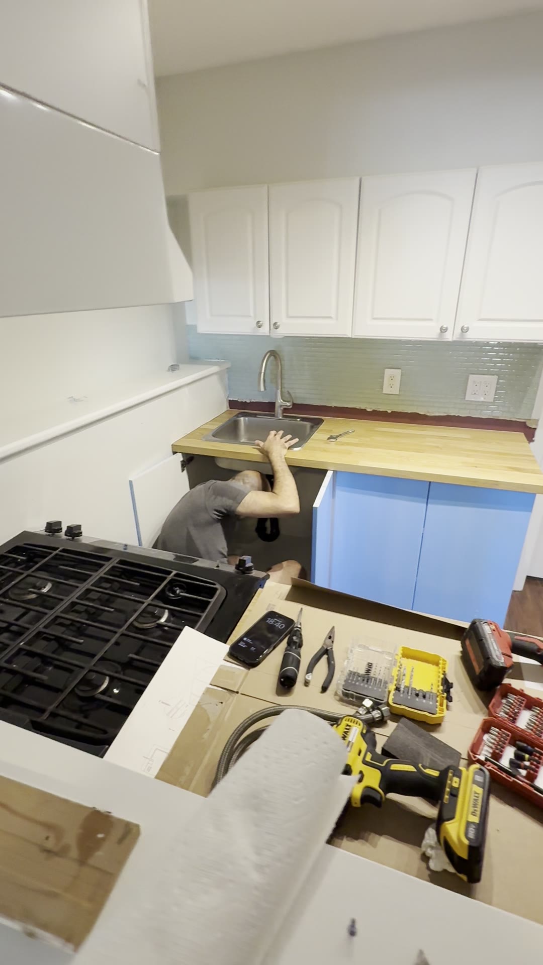 During — new cabinets and countertop being fitted.